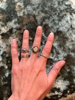 Lot vier zilveren ringen Claddagh, tribal, gifring, evil eye, Gebruikt, Ophalen of Verzenden, Kleiner dan 17, Met edelsteen