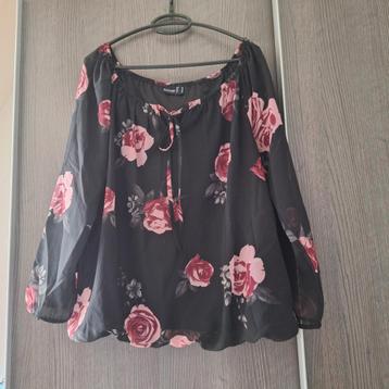 Dames blouse met lange mouwen en elastiek onderin beschikbaar voor biedingen