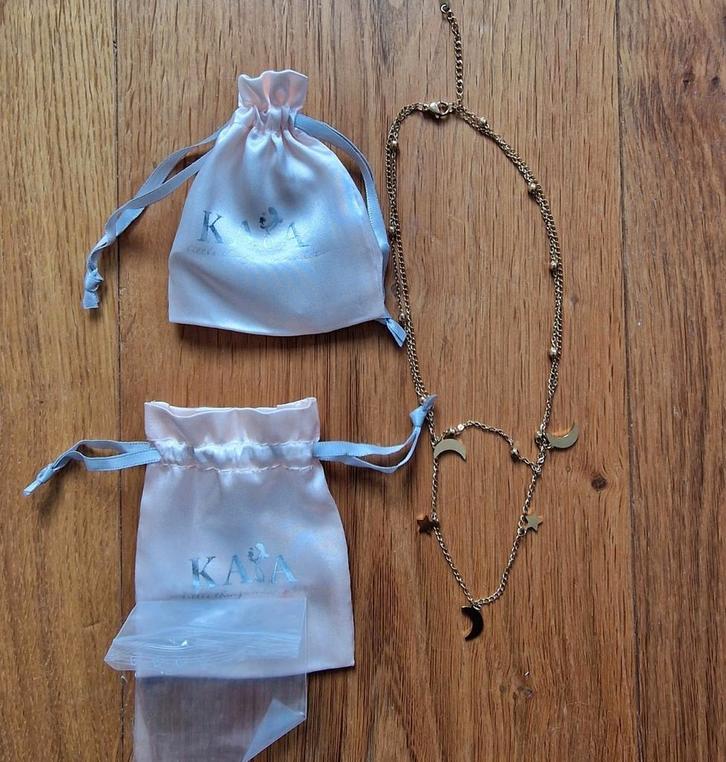 Nieuw! Kaya ketting stainless steel met goudkleurige bedels, Sieraden, Tassen en Uiterlijk, Kettingen, Nieuw, Overige materialen