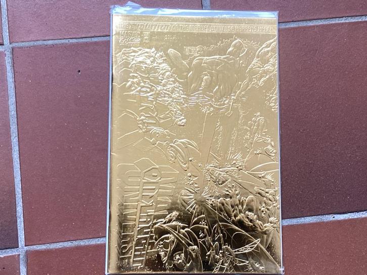 X-Men Onslaught: Marvel Universe 1 Gold cover + certificaat, Boeken, Strips | Comics, Zo goed als nieuw, Eén comic, Amerika, Ophalen of Verzenden