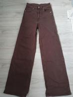 Bruine flare jeans maat 34, Kleding | Dames, Gedragen, H&M, Ophalen of Verzenden, W27 (confectie 34) of kleiner