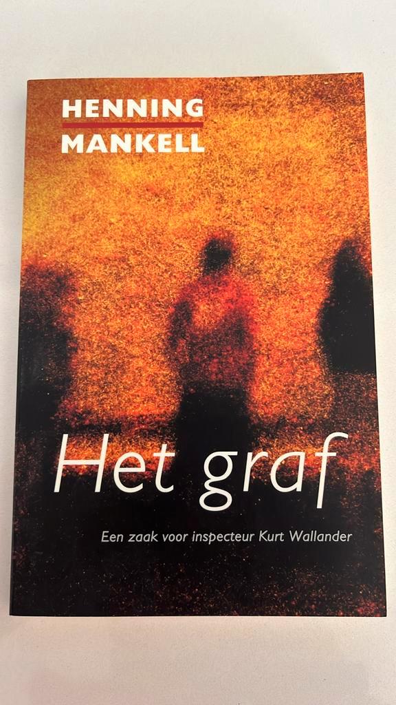 Henning Mankell - Het graf, Boeken, Thrillers, Zo goed als nieuw, Nederland, Ophalen of Verzenden