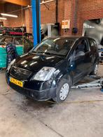 Citroen c2 1.1 2007, Auto's, 63 pk, 4 cilinders, Zwart, Handgeschakeld
