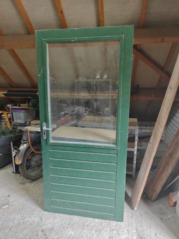 (Lood-) Zware buitendeur met dubbel glas incl dag.  beschikbaar voor biedingen