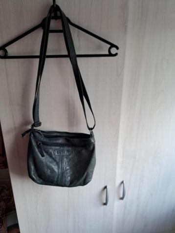 Mooie dames handtas van district  beschikbaar voor biedingen