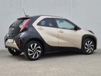 Toyota Aygo X 1.0 VVT-i S-CVT Play Automaat / Navigatie via, Auto's, Toyota, Stof, Gebruikt, Euro 6, Bruin