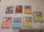 80 Pokemon Singles + Koffer + Allerlei Accesoires, Foil, Nieuw, Meerdere kaarten, Ophalen of Verzenden
