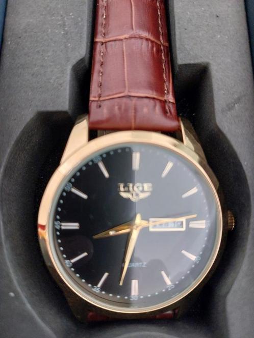 Verkocht, Sieraden, Tassen en Uiterlijk, Horloges | Heren, Zo goed als nieuw, Polshorloge, Overige merken, Goud, Leer, Ophalen of Verzenden