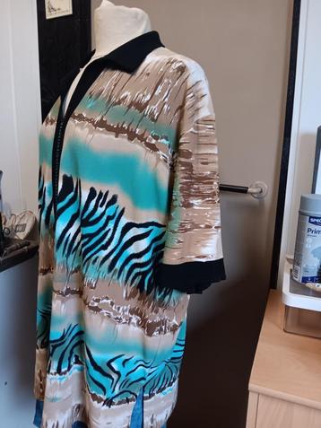 2 ruime langere shirts   z.g.a.n.   beschikbaar voor biedingen