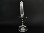 Een olielamp klok met Romeinse cijfers, Antiek en Kunst, Antiek | Tin, Ophalen of Verzenden