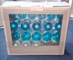 Glazen kerstballen en piek, Ophalen