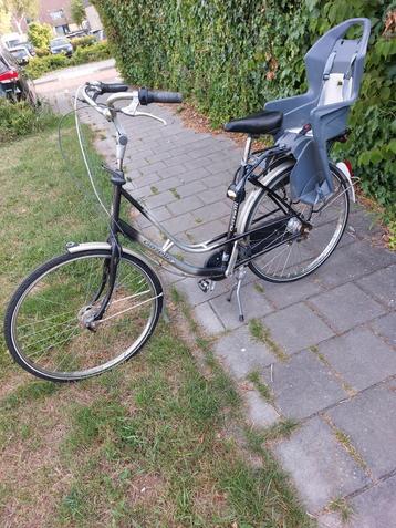Goedfietsende 28 inch  Gazelle Damesfiets met kinderzitje beschikbaar voor biedingen
