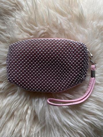 Zilveren roze tasje beschikbaar voor biedingen