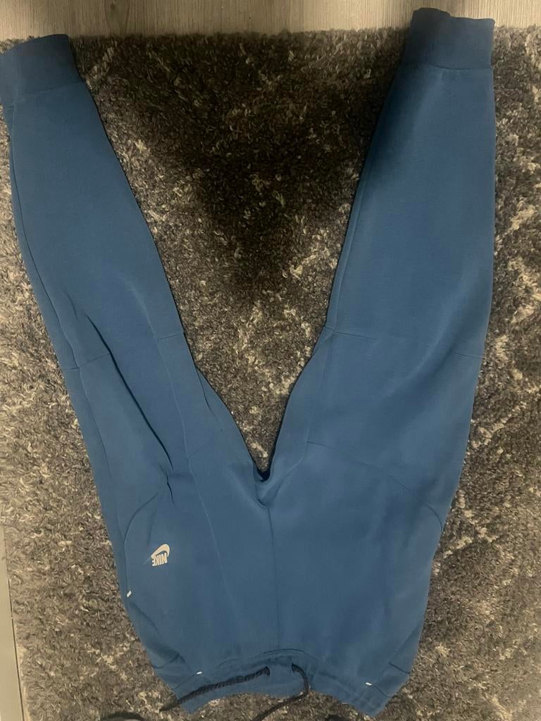 Nike Tech trainingsbroek blauw, Ophalen of Verzenden, Gedragen, Blauw, Overige jeansmaten