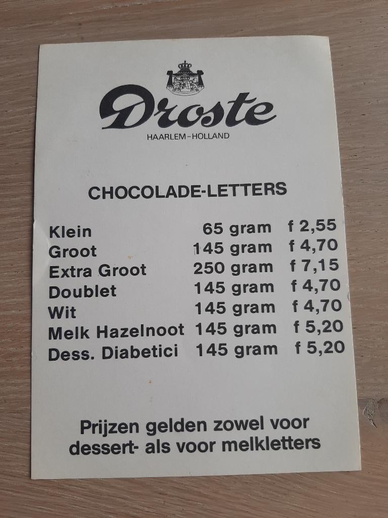 oude Droste chocoladeletter Winkelreclame prijslijst jaren80, Overige typen, Ophalen of Verzenden, Zo goed als nieuw, Droste