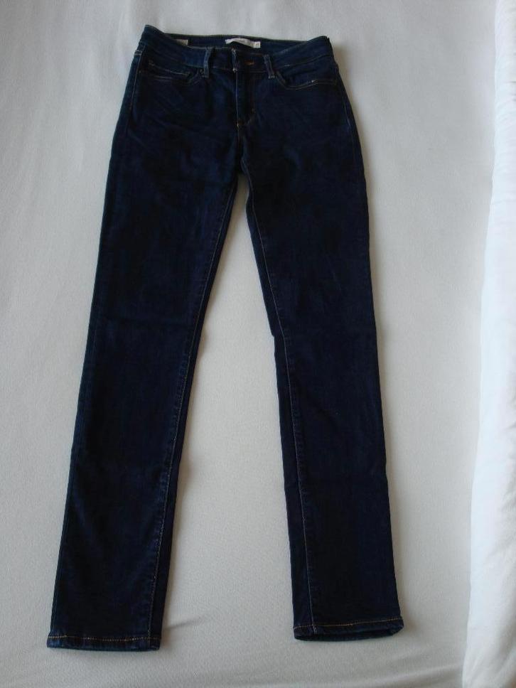 Lange donker blauwe LEVI'S 711 jeans. Jeansmaat 27., Kleding | Dames, Spijkerbroeken en Jeans, Zo goed als nieuw, W27 (confectie 34) of kleiner