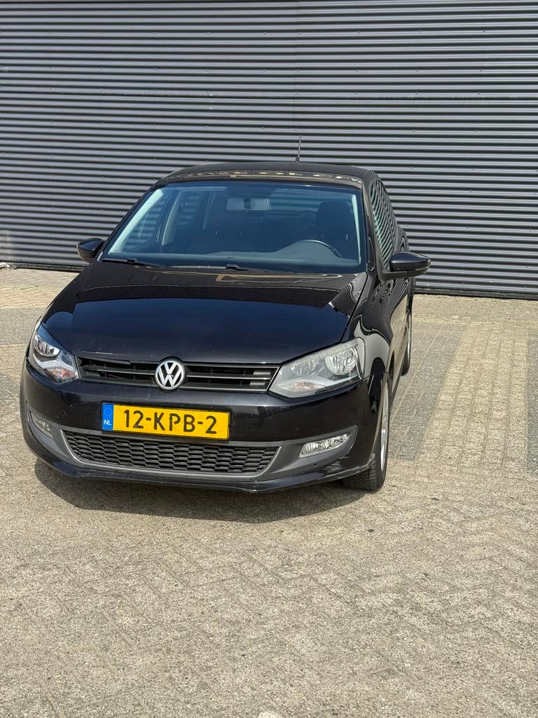 Volkswagen Polo 1.4 Highline 2010 Zwart 5 deurs, Auto's, Volkswagen, Voorwielaandrijving, 970 kg, Stof, 40 €/maand