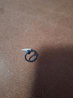 Opvallende Piercing met Blauw Glow-in-the-Dark Accent, Sieraden, Tassen en Uiterlijk, Piercings, Ophalen of Verzenden, Zo goed als nieuw