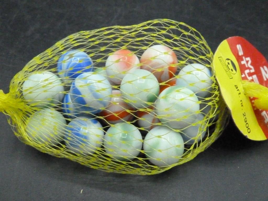 Netje met 20 melkstuiters jaren 60 16 mm, Ophalen of Verzenden
