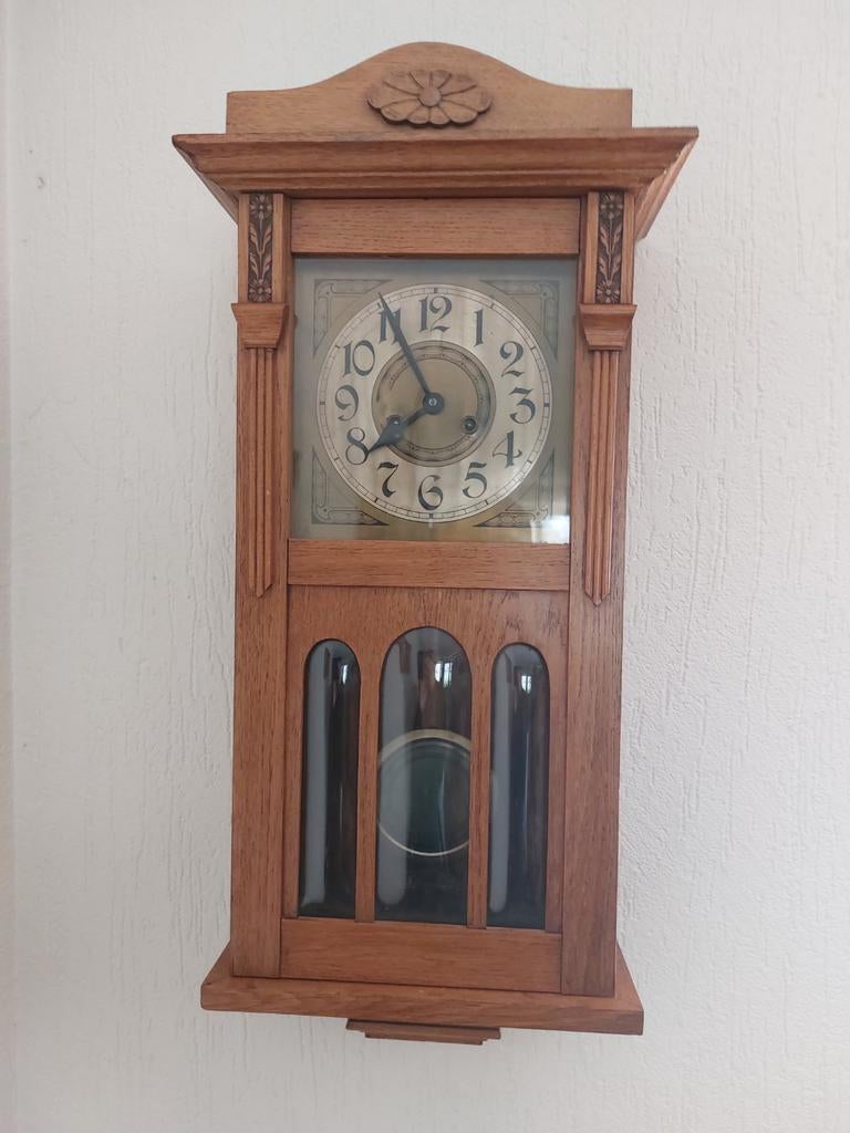 Antieke  klok loopt niet, Ophalen