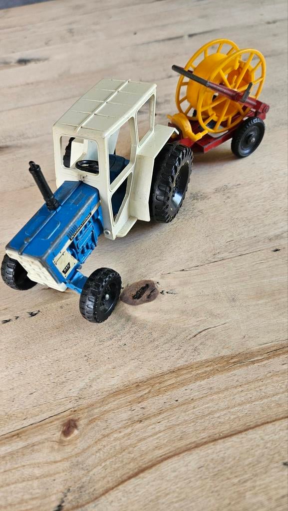 Lone-Star Ford trekker met aanhanger., Hobby en Vrije tijd, Modelauto's | 1:32, Ophalen of Verzenden, Tractor of Landbouw, Britains