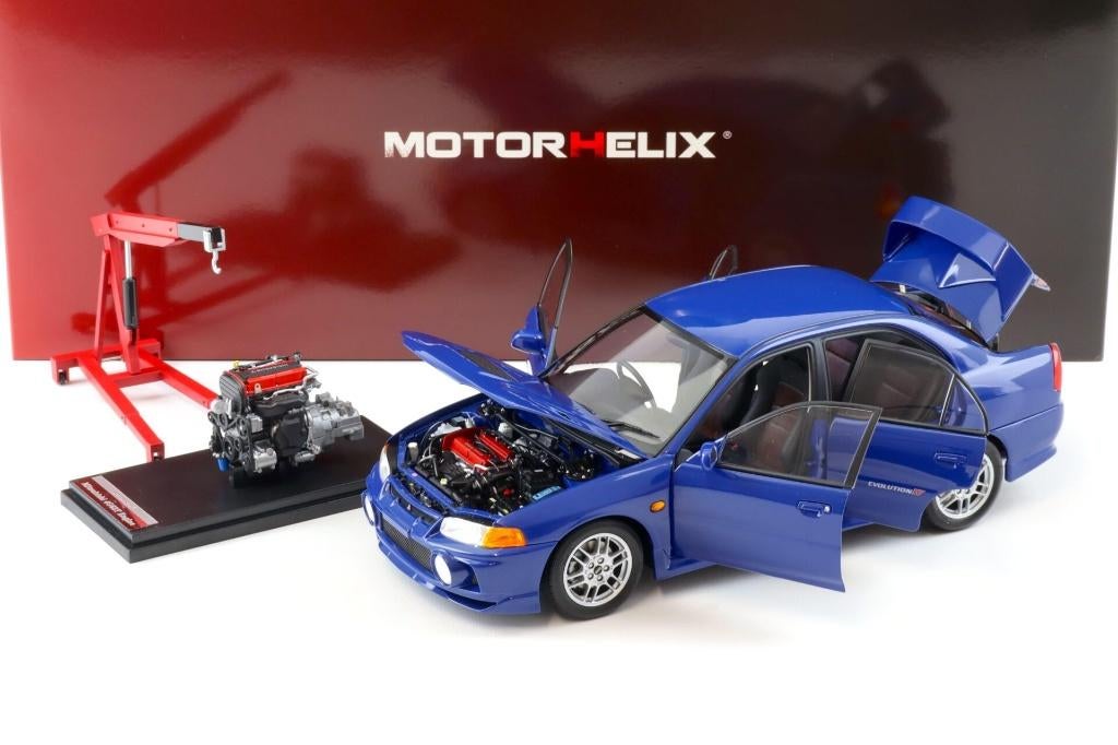 1:18 Mitsubishi Lancer Evolution IV - 1999 Blauw Motorhelix, Hobby en Vrije tijd, Modelauto's | 1:18, Overige merken, Auto, .