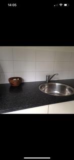 Zwart marmeren aanrechtblad, Ophalen