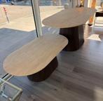 Ovale travertin eettafel of salontafel in het bruin en crème, Huis en Inrichting, Tafels | Eettafels, Overige materialen, Nieuw