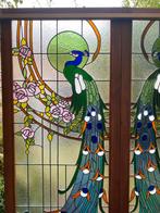 glas in loodramen met pauwen, Ophalen