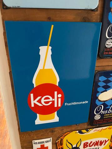Emaille reclame bordje , ke-li frisdrank beschikbaar voor biedingen