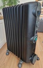 Zwarte Delonghi radiator TRRS0920C.B, z.g.a.n. *w, Doe-het-zelf en Verbouw, Ophalen, 30 tot 80 cm, Radiator, Minder dan 60 cm