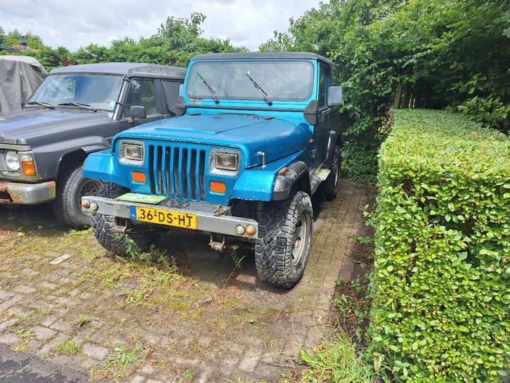 Jeep Wrangler 2.5 I Softtop 4WD U9 1994 Blauw, Auto's, Jeep, Particulier, Wrangler, Benzine, SUV of Terreinwagen, Handgeschakeld