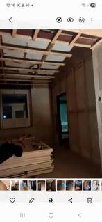 Schilder of behangen .timmer afwerk