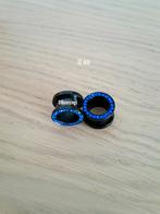 Nieuwe tunnels. Staal. Zwart. Blauwe steentjes. 4, 5, 6 - 16, Ophalen of Verzenden, Zo goed als nieuw, Staal, Oor- of Traguspiercing