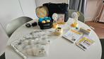 Medela Freestyle Dubbele Elektrische Borstkolf & Extra's!, Ophalen of Verzenden, Zo goed als nieuw, Borstkolf
