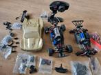 Traxxas slash 1/16 4x4 plus een extra chassi en veel onderde, Hobby en Vrije tijd, Modelbouw | Radiografisch | Auto's, Elektro