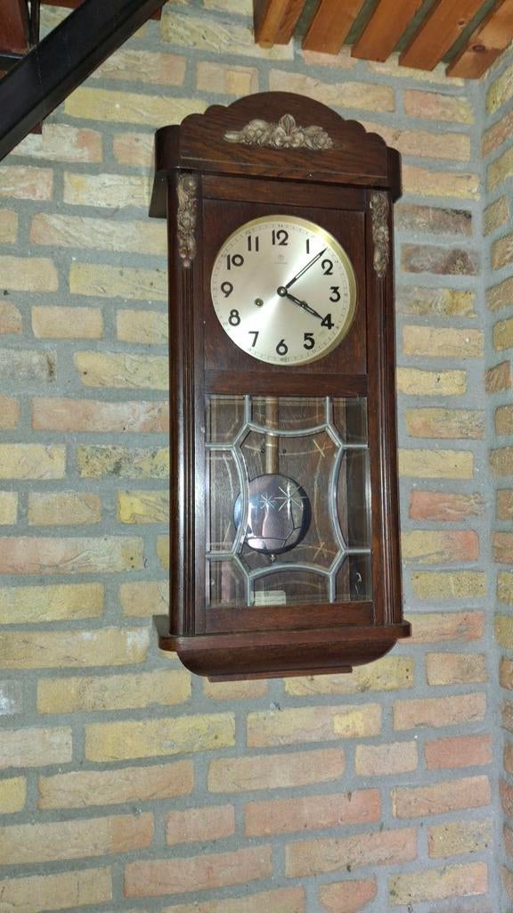 Oude eiken Junghans klok, Ophalen