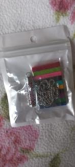 RVS Aromatherapie hanger met (na)vulling, nieuw!, Nieuw, Ophalen of Verzenden, Zilver, Overige materialen