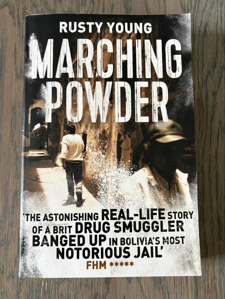 Boek: Marching Powder - Rusty Young, Boeken, Biografieën, Zo goed als nieuw, Overige, Ophalen of Verzenden