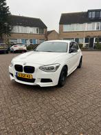 BMW 1-Serie 116i 136PK 5D Aut. 2015 Wit, 1295 kg, 4 cilinders, Alcantara, Wit