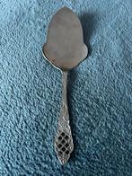 Verzilverde taartschep, Ophalen