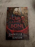 A curse carved in bone - danielle l jensen, Boeken, Fantasy, Ophalen of Verzenden, Zo goed als nieuw