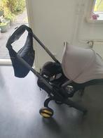 Doona autostoel en kinderwagen in één met regenhoes, Doona EU, Doona, Duowagen, Zo goed als nieuw