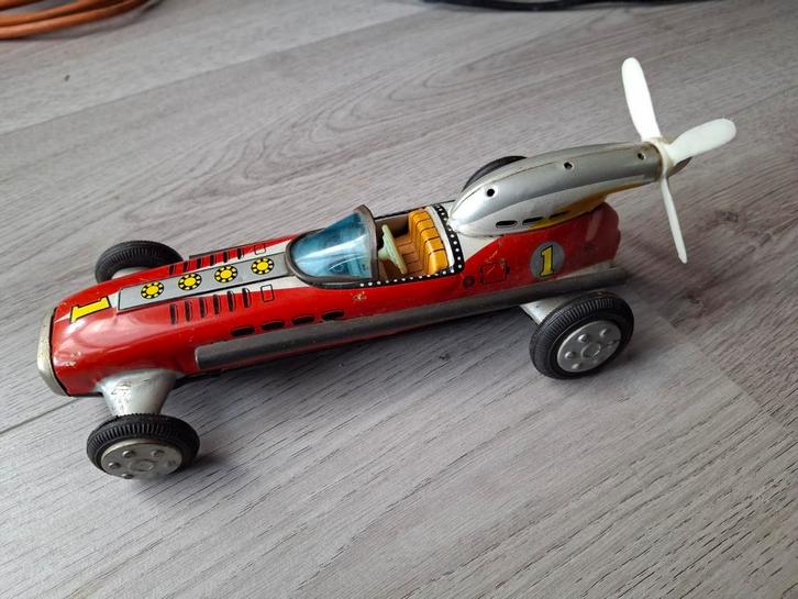 Tinnen speelgoed auto met propeller 1957, Antiek en Kunst, Antiek | Speelgoed, Ophalen of Verzenden