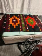 Antiek gemaakt tapijt, Ophalen