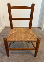 Houten kinderstoel met biezen mat, Ophalen