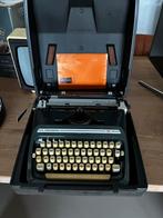 Triumph typemachine in koffer, Ophalen