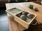 Jeu de boules set, Ophalen