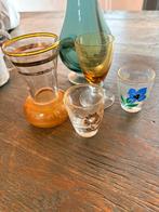 Glazen vaas en kleine vaasjes, ooit gespaard, Ophalen