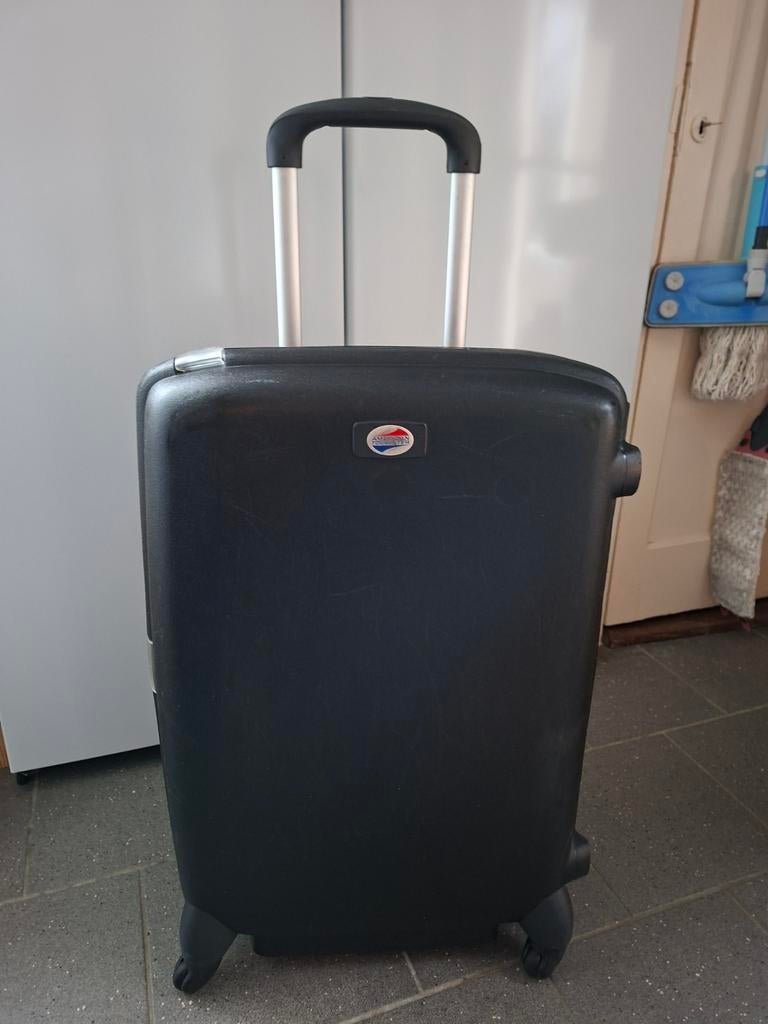 American tourister made by samsonite spinner, Ophalen